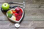 image of fruit bowl and stethoscope for general health