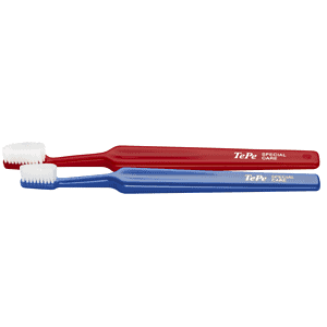 TePe Special Care Sensitive Toothbrush red regular and blue compact on a white background